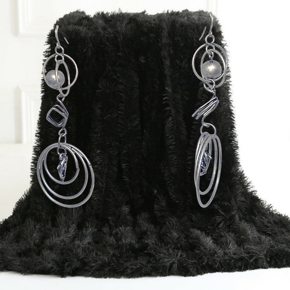 Jewelry - 👣4/$20. Dangling Silver Tone Earrings with Dolphins